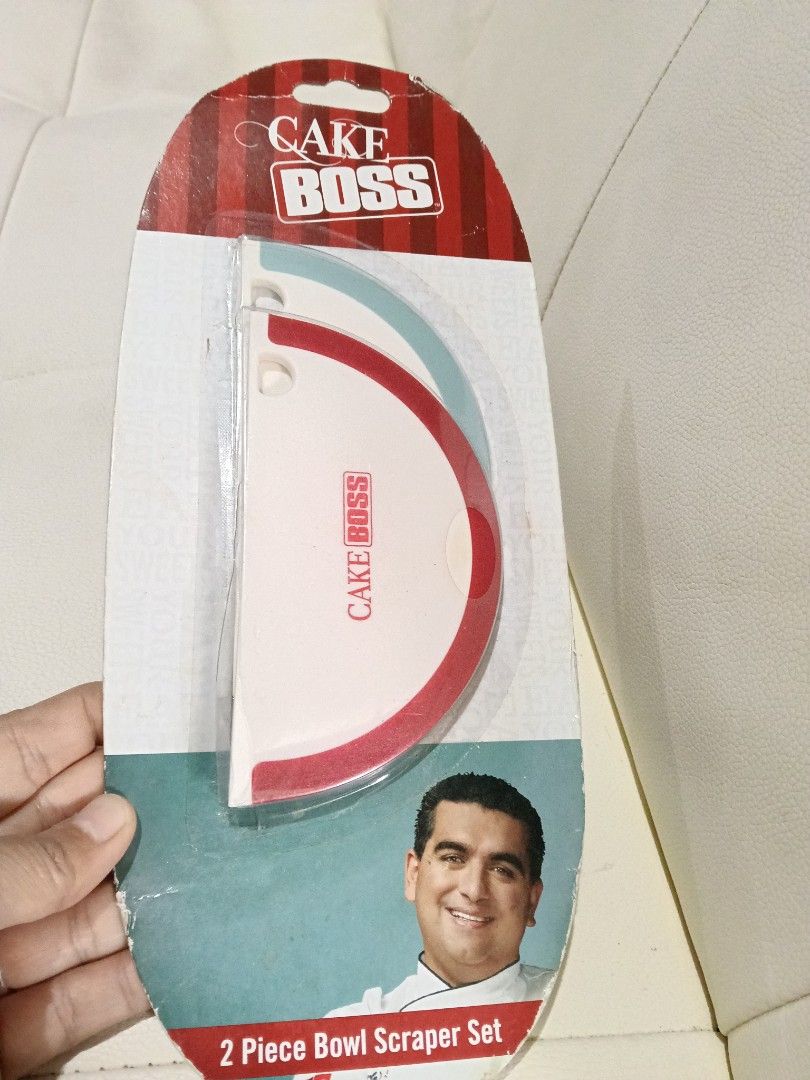 Cake Boss 2 Piece Bowl Scraper Set (Category: Bakeware) located in Manila. Submitted by zenbear_6b2d8a (Listing ID 1466968706, Image 1). Description: - Authentic Cake Boss collection bowl scrapers, set of 2 - Brand new and unopened packaging (Item #59392) - Sturdy nylon core with flexible silicone scraping edge - Easily gets every bit of batter, buttercream, or sauce from mixing bowls - Dishwasher safe for easy cleanup.