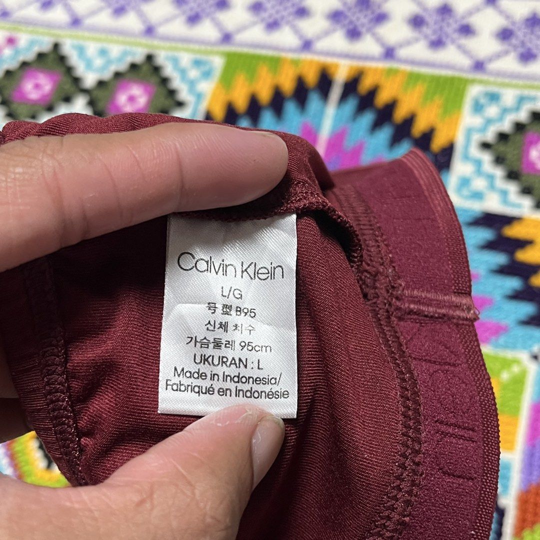 Calvin Klein Maroon Bralette Size L (Category: Undergarments & Loungewear) located in Dagupan City. Submitted by vernzkee (Listing ID 1466820917, Image 3). Description: - Brand: Calvin Klein - Item: Bralette - Color: Maroon / Dark Red - Size: Large (95cm bust tag) - Features: Elastic logo underband, adjustable straps, smooth fabric cups - Origin: Made in Indonesia - Condition: Brand new / Excellent Location: Dagupan City, Pangasinan MOP: Gcash, G