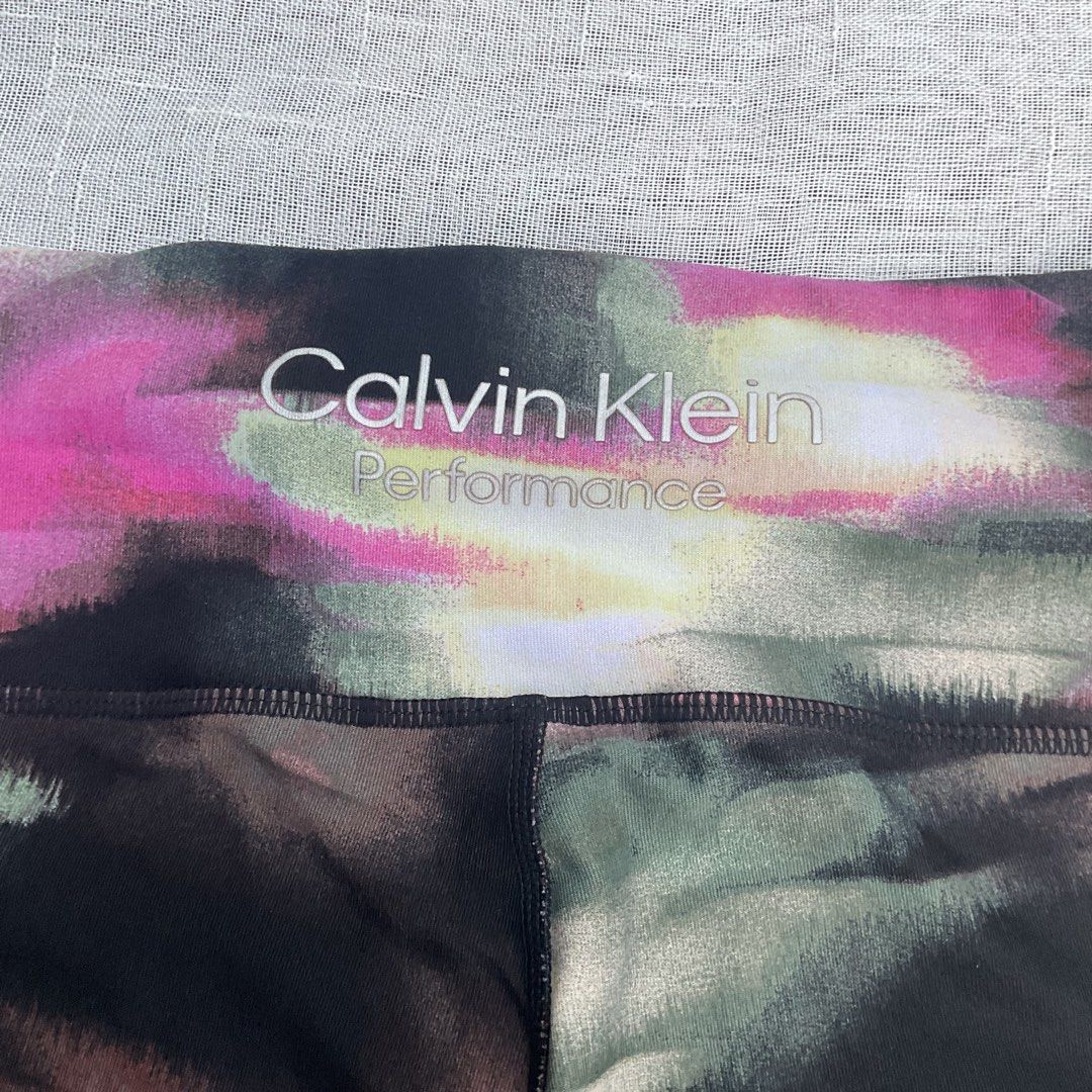 CALVIN KLEIN PERFORMANCE LEGGINGS (Category: Activewear) located in Basista. Submitted by b.boutique (Listing ID 1466913318, Image 3). Description: CALVIN KLEIN PERFORMANCE LEGGINGS Size: 28-32 Length:33.5 Color: Abstract multicolor Like new condition! With side pockets!.