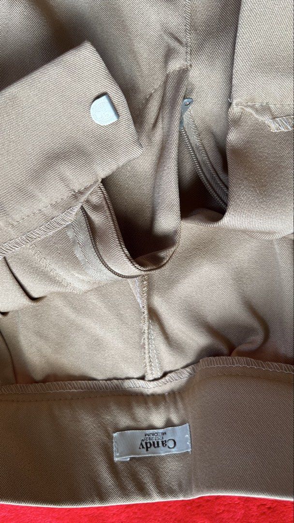 Candy Est. 2021 Beige Wide Leg Pants Medium (Category: Jeans) located in Manila. Submitted by tineemall (Listing ID 1466784474, Image 2). Description: - Brand: Candy Est. 2021 - Color: Beige - Size: Medium - Style: Wide-leg trousers - Details: Pleated front, structured waistband with belt loops, zipper fly closure, and clean fabric finish.