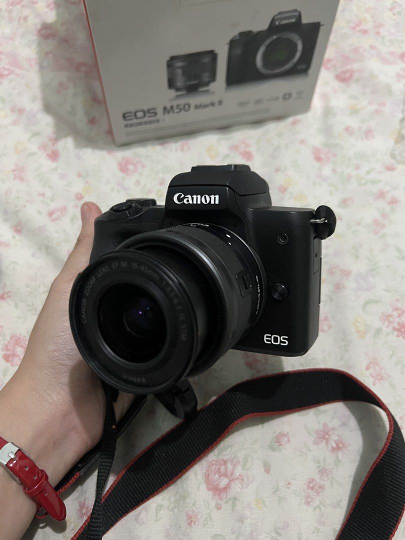 Canon EOS M50 Mark II Mirrorless Camera Kit (Category: Cameras) located in Manila. Submitted by mijareszophia8 (Listing ID 1466923070, Image 3). Description: ★ Canon EOS M50 Mark II 📸 ╰─➤ ₱32,999 FIXED! ✨ ✨ COMPLETE SET • READY TO USE ✨ 📸 Condition: • No issues • Can pass as brand new! 🤍✨ 📦 Inclusions: • Z Clicks Paper Bag • Lanyard • Wipes • Stickers • Review Cards • Calling Cards • Canon EOS M50 Mark II Unit • Kit Lens • Original Battery • 