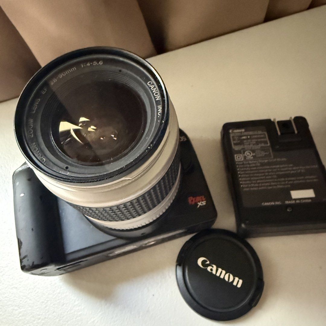 Canon EOS Rebel XS DS126191 (Category: Cameras) located in Manila. Submitted by cheemkenn (Listing ID 1466835040, Image 3). Description: Canon EOS Rebel XS (1000D) DSLR Camera Package Selling a Canon EOS Rebel XS DSLR camera kit. A great, lightweight beginner DSLR camera setup perfect for photography beginners, students, or hobbyists looking to get into real camera photography. What’s Included: - Canon EOS Rebel XS Body - Silver Canon Zoom Lens (