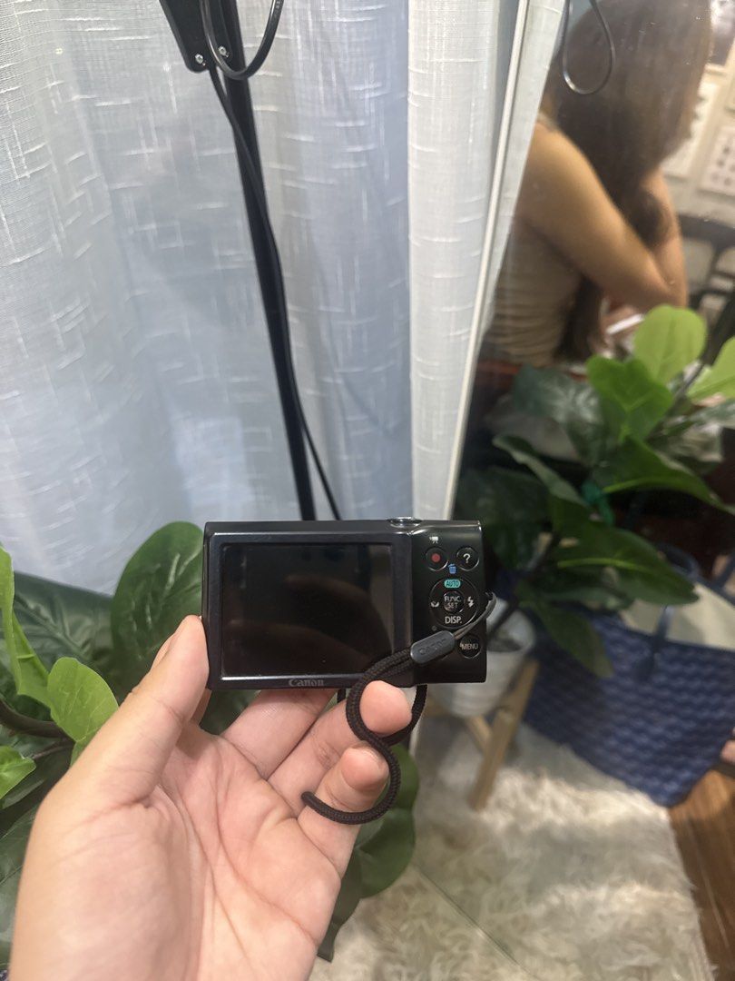Canon PowerShot A2300 HD Digital Camera Black (Category: Cameras) located in Calamba. Submitted by leeadriannn796 (Listing ID 1466893362, Image 2). Description: Canon PowerShot A2300 HD digital camera in black. Compact 16.0 megapixel model with 5x optical zoom lens. Includes attached wrist strap. Standard buttons on the back and top on/off switch. Bottom tripod mount and battery compartment door. Pocket-sized point and shoot camera for casual pho