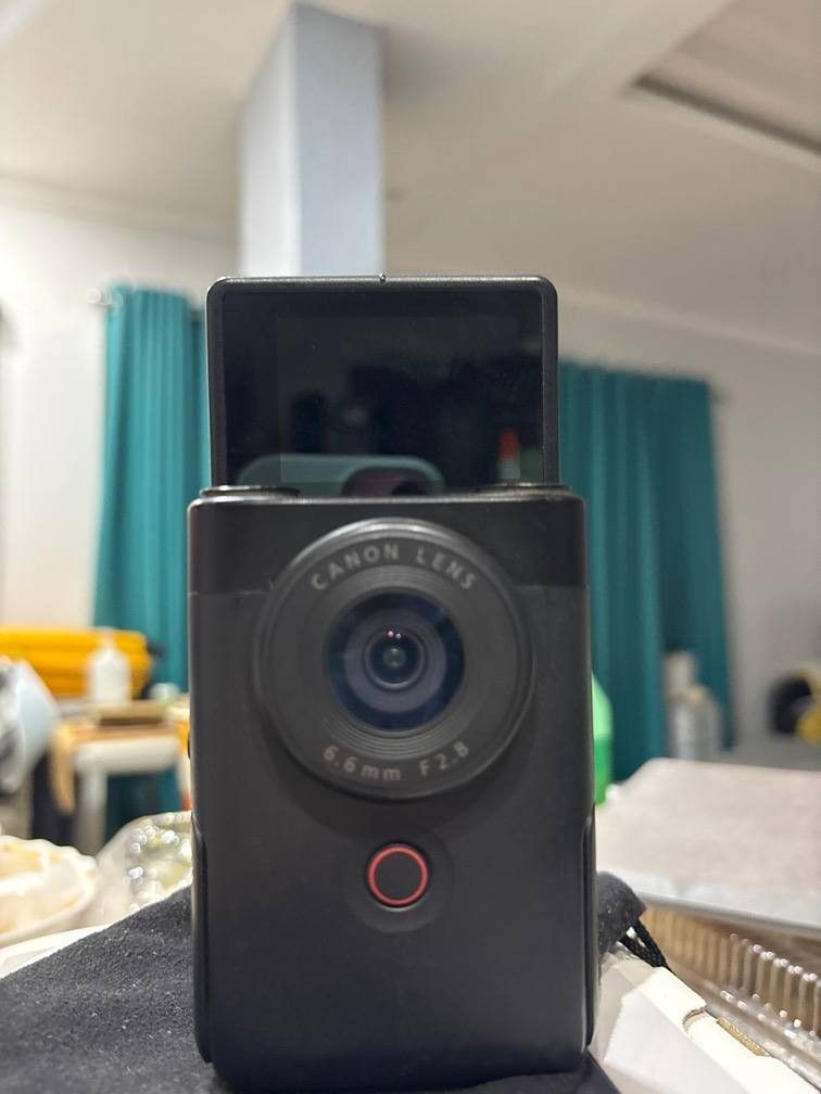 canon powershot v10 vlogging camera (Category: Cameras) located in Las Pinas. Submitted by jaisalva_ (Listing ID 1466886070, Image 2). Description: • model: canon powershot v10 compact vlogging camera (bought last july 2024) • color: sleek black • key features: flip-up screen and built-in kickstand for multi-angle shooting • inclusions: smallrig camera cage (model 4235) & king mini grip stand (model mini-gs) • condition: excellent, minimal flaws,