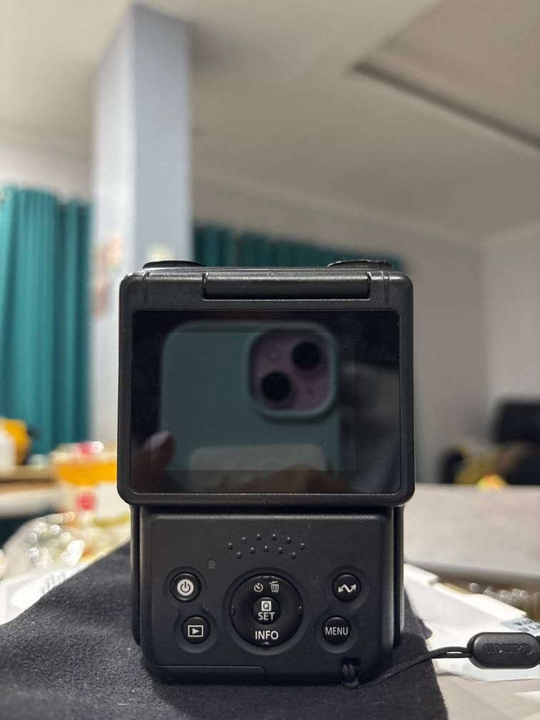 canon powershot v10 vlogging camera (Category: Cameras) located in Las Pinas. Submitted by jaisalva_ (Listing ID 1466886070, Image 3). Description: • model: canon powershot v10 compact vlogging camera (bought last july 2024) • color: sleek black • key features: flip-up screen and built-in kickstand for multi-angle shooting • inclusions: smallrig camera cage (model 4235) & king mini grip stand (model mini-gs) • condition: excellent, minimal flaws,