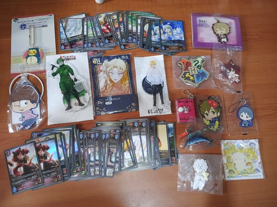 Cards and charms (Category: Trading Cards Accessories) located in Las Pinas. Submitted by jennyheaven (Listing ID 1466814535, Image 1). Description: - 105pcs Shadowverse Evolve cards (21pcs holos, 84pcs regular - 3pcs acrylic standees - 11pcs charms.