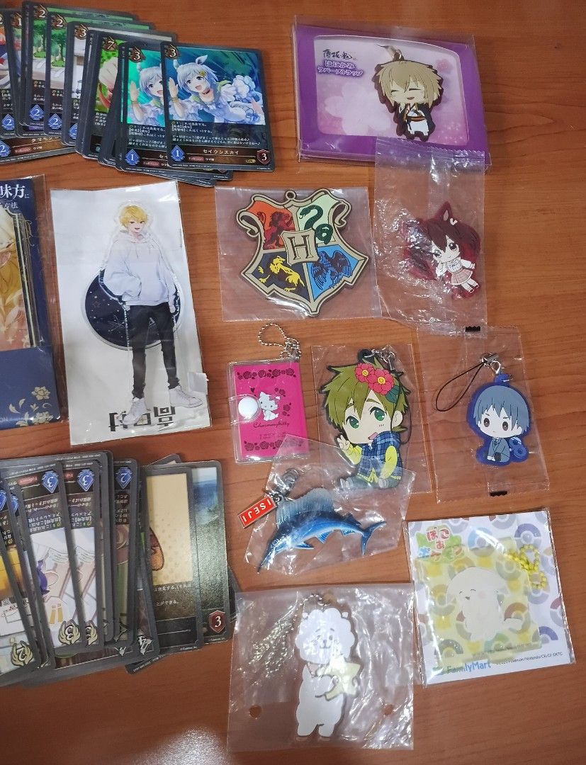 Cards and charms (Category: Trading Cards Accessories) located in Las Pinas. Submitted by jennyheaven (Listing ID 1466814535, Image 3). Description: - 105pcs Shadowverse Evolve cards (21pcs holos, 84pcs regular - 3pcs acrylic standees - 11pcs charms.