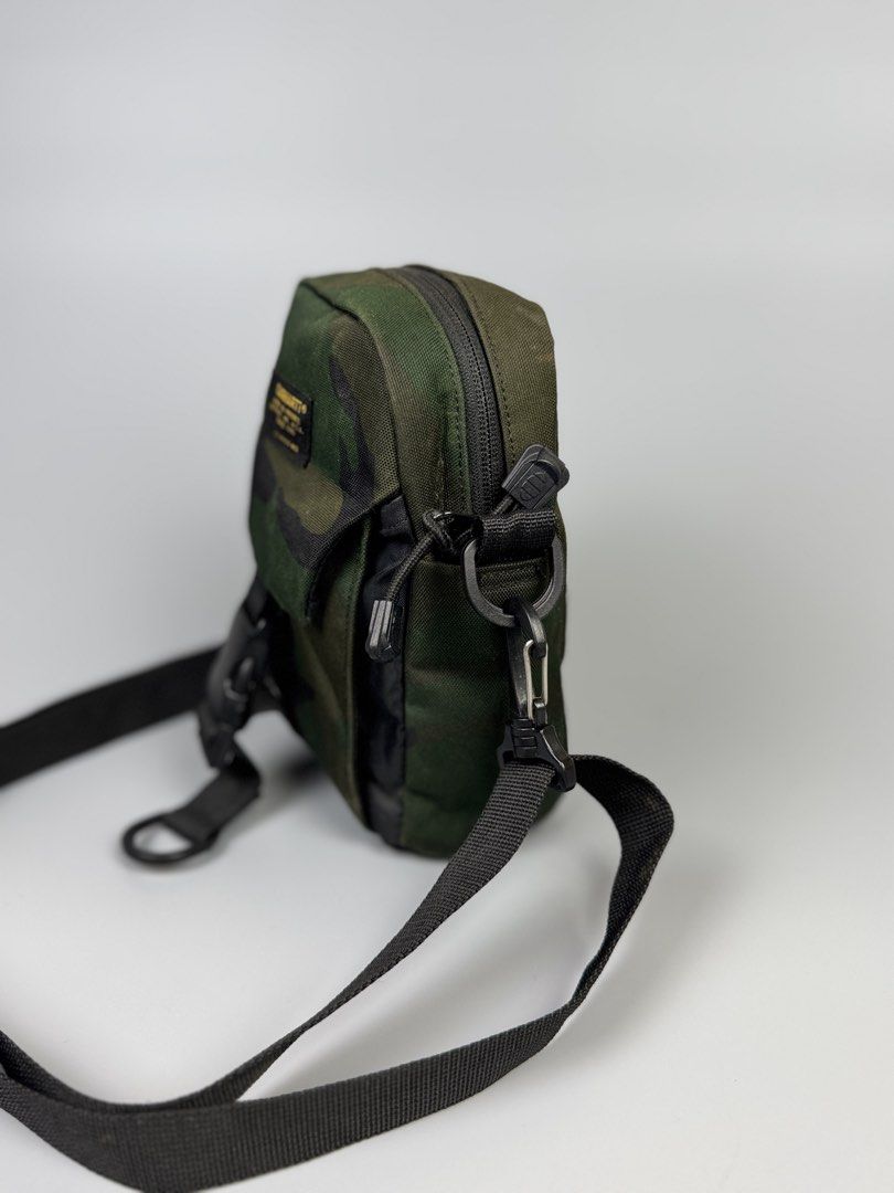 Carhartt - Camouflage Sling Bag (Category: Sling Bags) located in Quezon City. Submitted by japon_rose (Listing ID 1466967612, Image 3). Description: READ DESCRIPTION FIRST BEFORE YOU START A DEAL GUARANTEED AUTHENTIC ❗️ Carhartt - Camouflage Sling Bag Color: Green Dimensions: Length: 8 Width: 6.5 Side: 3 Under: 3 Body strap: Adjustable (MEASURED IT BY INCHES) Condition: Can passed to 9.5/10 overall condition of usage, no issues or any flaws. Sti