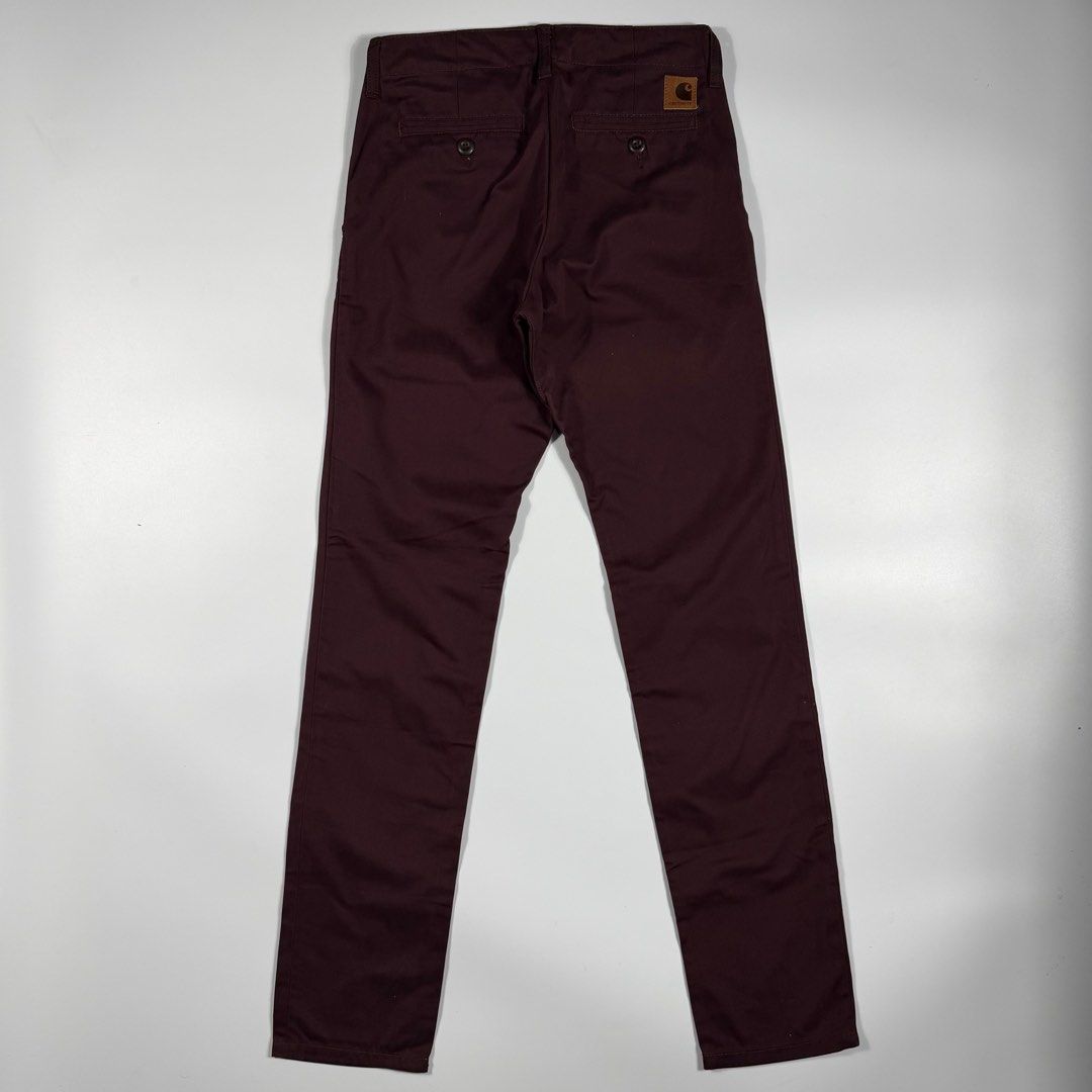 Carhartt Club Pant (Category: Jeans) located in Bacolod City. Submitted by freshstuff13 (Listing ID 1466830210, Image 1). Description: - Brand: Carhartt - Model: Club Pant - Color: Burgundy - Size: 28x32 - Material: 100% cotton twill - Closure: Button closure with zip fly - Pockets: Dual front pockets and dual buttoned welt back pockets - Details: Iconic square Carhartt brand patch on the rear pocket - Condition: Clean interior lining with printe