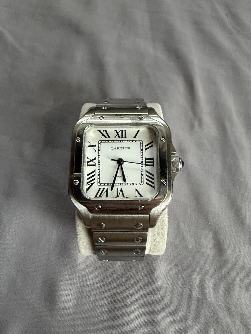 Cartier Santos De Cartier Medium (Category: Luxury Watches) located in Manila. Submitted by 1vktry (Listing ID 1466969820, Image 1). Description: Case width: 35.1 mm Thickness: 8.83 mm Flaws: none Comes with 4 extra links Replacement Box but no papers Price: 6k .