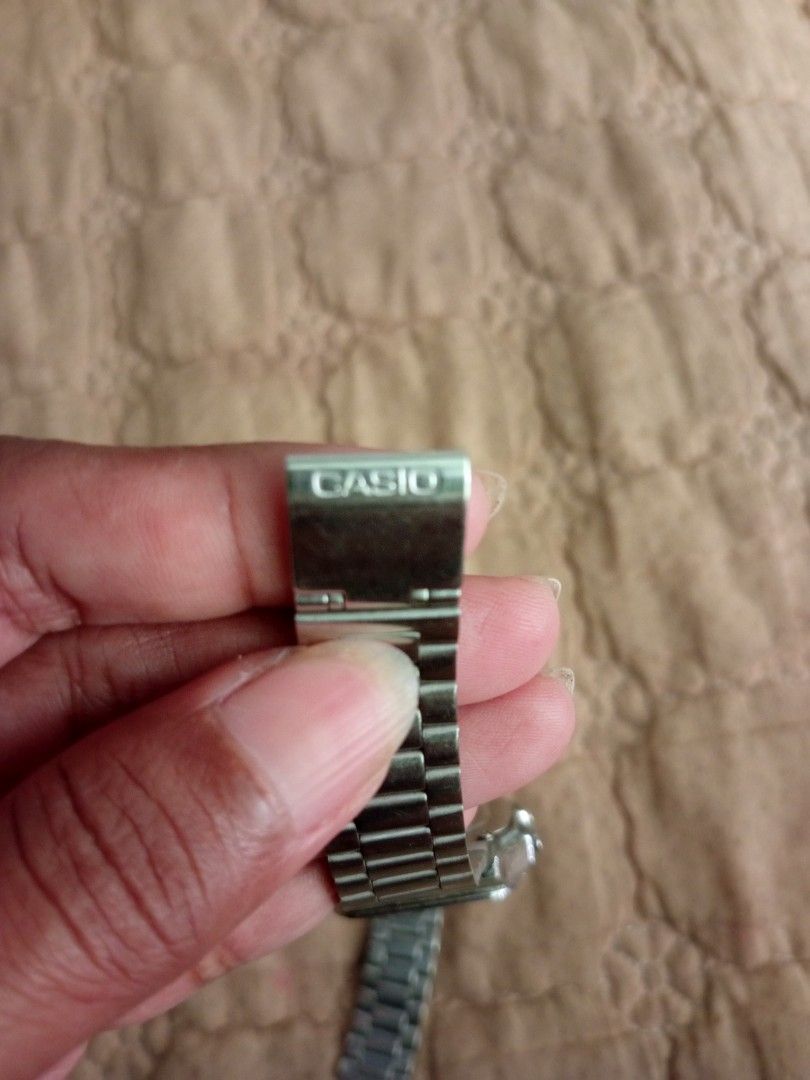 Casio A178W Vintage Digital Watch (Category: Men's Watches) located in Pasig City. Submitted by dhays27 (Listing ID 1466807228, Image 3). Description: - Model: Casio A178W with stainless steel bracelet - Features: Dual time, alarm chrono, and reliable 10-year battery - Condition: Fully working LCD screen; shows normal wear around the case bezel and buttons - Authenticity: Backplate stamped with model number and water-resistant rating - Perfect ev