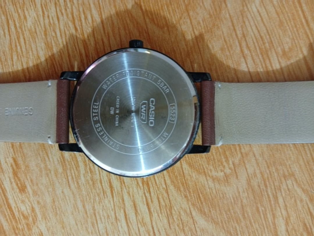 Casio MTP-B105 wristwatch with brown leather strap (Category: Men's Watches) located in Caloocan City. Submitted by grandmountain_ca5a79 (Listing ID 1466794065, Image 3). Description: - Model: Casio MTP-B105 (Module 5523) - Dial: Black with elegant rose gold hands, hour markers, and two sub-dials - Strap: Genuine brown leather with contrast white stitching and standard buckle - Movement: Reliable battery-operated quartz - Durability: Stainless st