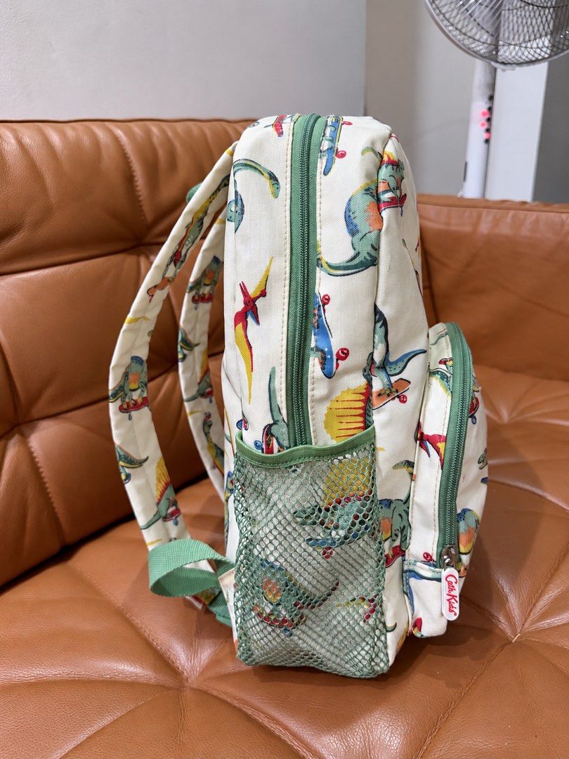Cath Kids Dinosaur Kids Backpack (Category: Babies & Kids Fashion) located in Pasig City. Submitted by hellolala.94 (Listing ID 1466897118, Image 2). Description: Cath Kidston Has very minimal dirt marks near the bottom of the straps, as shown in the photo. Other than that, the bag is still in great overall condition. The quality is really nice and the bag is still beautiful and well-maintained..