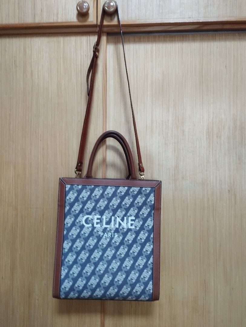 Celine Vertical Cabas Monogram Tote Bag with Strap (Category: Luxury Bags & Wallets) located in Baguio. Submitted by katgon2016 (Listing ID 1466903742, Image 1). Description: - Authentic Celine in coated canvas with brown leather trim - Features bold white Celine Paris branding on the front - Double top handles and an adjustable shoulder strap for crossbody wear (non- Celine brand/replaced) - Structured vertical shape with clean side gussets - Gr
