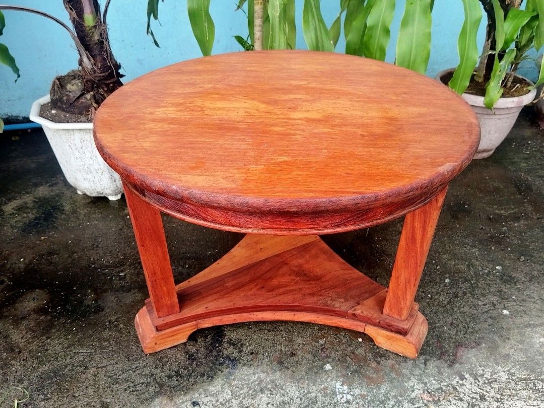 Center Table (Category: Tables & Sets) located in Meycauayan. Submitted by marygracecasimiro (Listing ID 1466775283, Image 1). Description: Round Center Table made of solid Narra Wood. Restored and revarnished. Ready to use. Get it for only P6,000. Diameter 23 x H17 inches🩷.