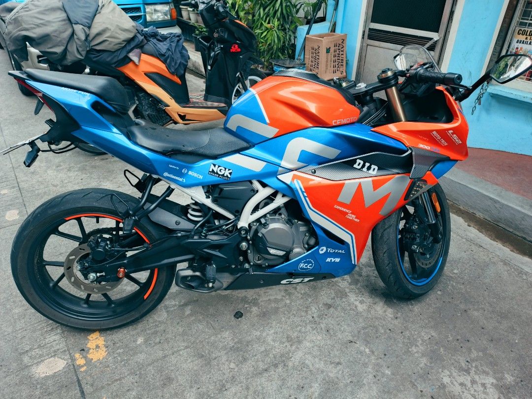 CFMoto 300SR Sportbike (Category: Motorbikes for Sale) located in Manila. Submitted by livedeer.608b16 (Listing ID 1466815521, Image 2). Description: RFS: Hospital Bill 🏍️ FOR SALE: CFMOTO 300SR – SLIPPER CLUTCH 📌 2022 Model 📌 Acquired: March 2023 📌 Mileage: 6,800 KM ONLY 📌 Slipper Clutch 📌 Blue & Orange Blaze 📌 Complete papers / ORCR 📌 All stock 📌 Tail tidy, side winglet & signal light upgrade 📌 Low mileage and well-maintained Selling 