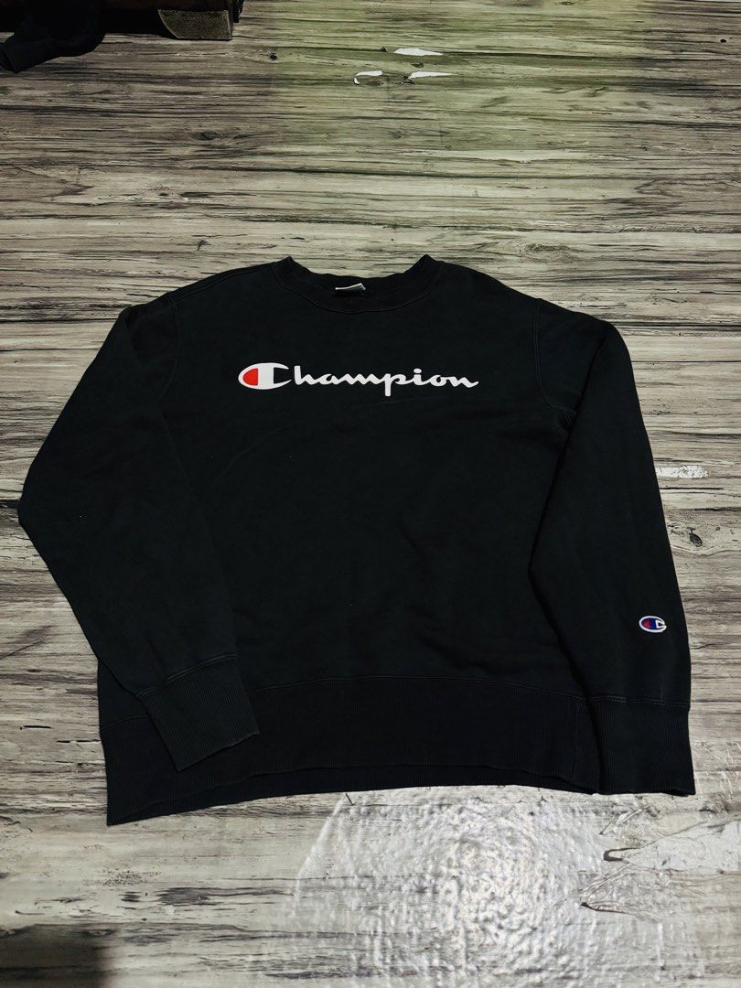 Champion Black Crewneck Sweatshirt with Script Logo (Category: Coats, Jackets and Outerwear) located in Quezon City. Submitted by lucky_wisefish.2ca7d6 (Listing ID 1466965679, Image 1). Description: - Authentic black Champion sweatshirt - Classic script logo across the chest - Signature embroidered C patch on the left sleeve - Heavyweight, warm cotton blend - Ribbed cuffs, collar, and hem for a snug fit - Versatile design, perfect to match with j