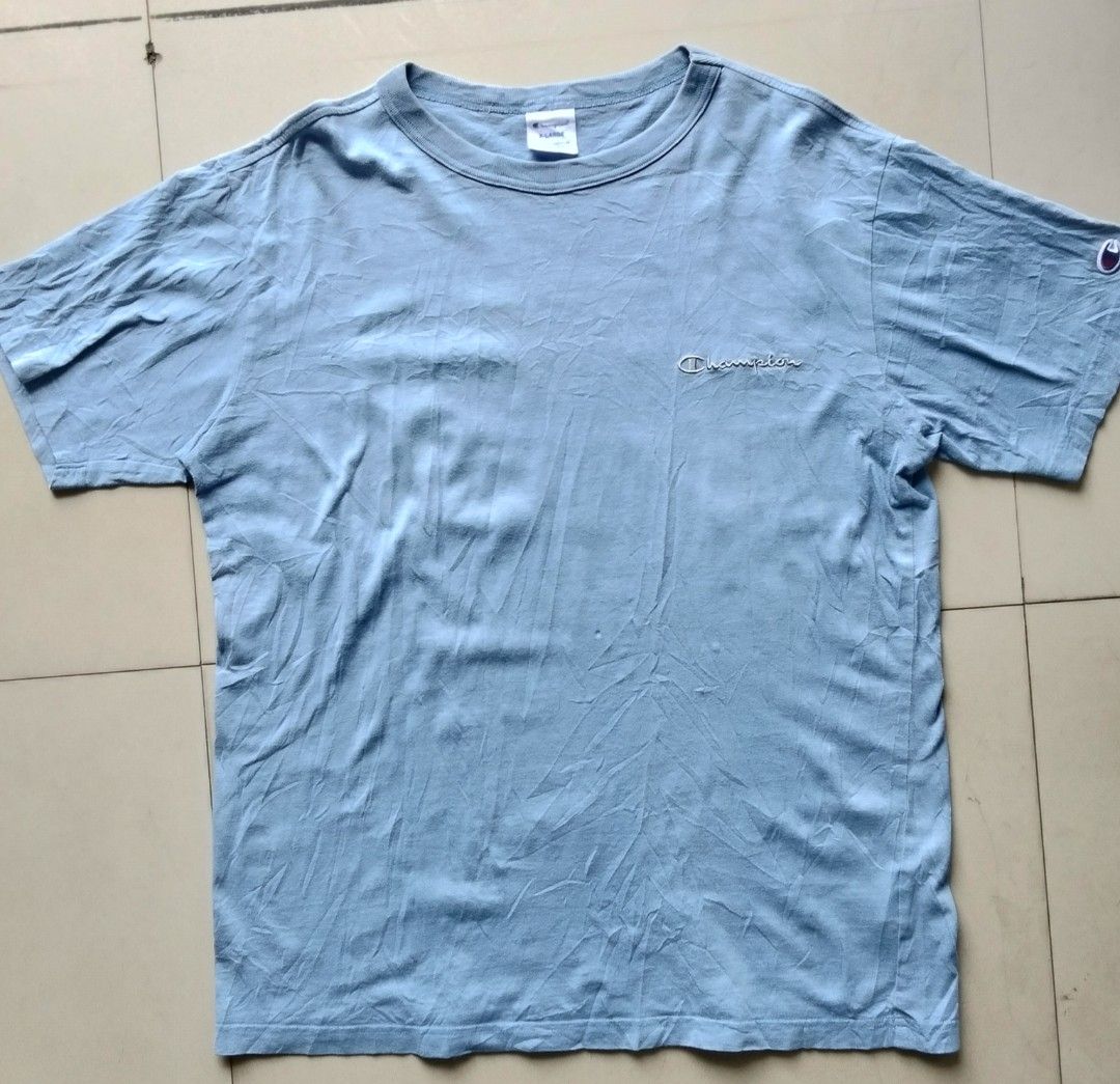 Champion T shirt (Category: Activewear) located in Monkayo. Submitted by youknowwho.27 (Listing ID 1466794052, Image 1). Description: Dimes: 21X27.5 authentic +sf.