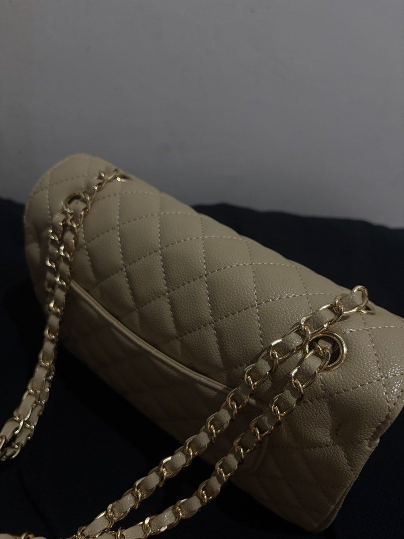 chanel bag beige (Category: Sling Bags) located in Quezon City. Submitted by myshop.galore (Listing ID 1466788906, Image 2). Description: hi may ganito na kasi akong color this is a gift selling for low price dents on the side.