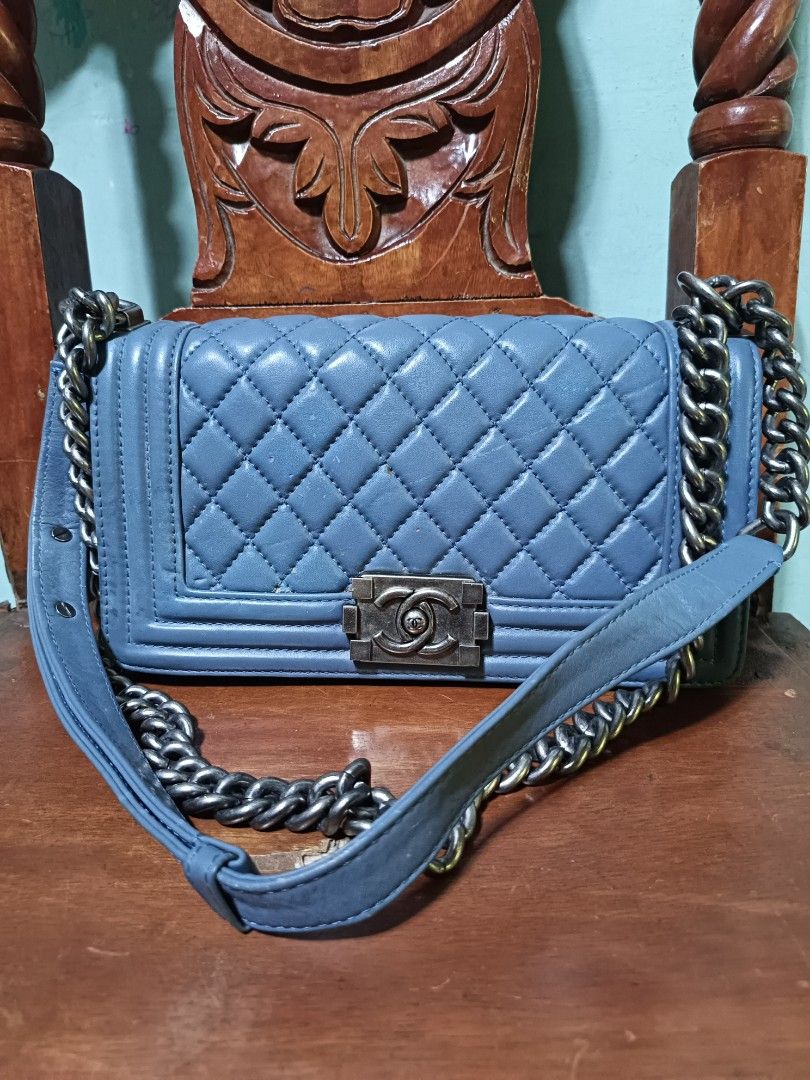 Chanel Boy Bag Quilted Blue Leather (Category: Luxury Bags & Wallets) located in Lucena. Submitted by jeankristi73450 (Listing ID 1466950367, Image 1). Description: -Please see detailed pictures - Chanel Boy Bag in gorgeous blue quilted leather - Silver-tone hardware with iconic CC push lock closure - Comfortable chain strap with leather shoulder guard - Light fabric-lined interior with 'Chanel Made in Italy' leather tag - Condition: Minor scratc