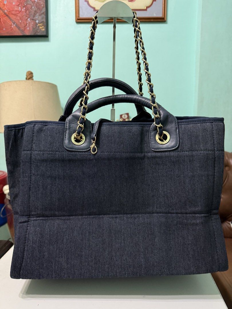 Chanel Deauville Tote Bag (Category: Tote Bags) located in Davao. Submitted by bellbeldz (Listing ID 1466895587, Image 2). Description: -Blue denim canvas with leather trim and dual top handles -in perfect condition -Pretty in actual -With hologram sticker but Auth not guaranteed (in my opinion, it’s orig) -Message me for more pics .