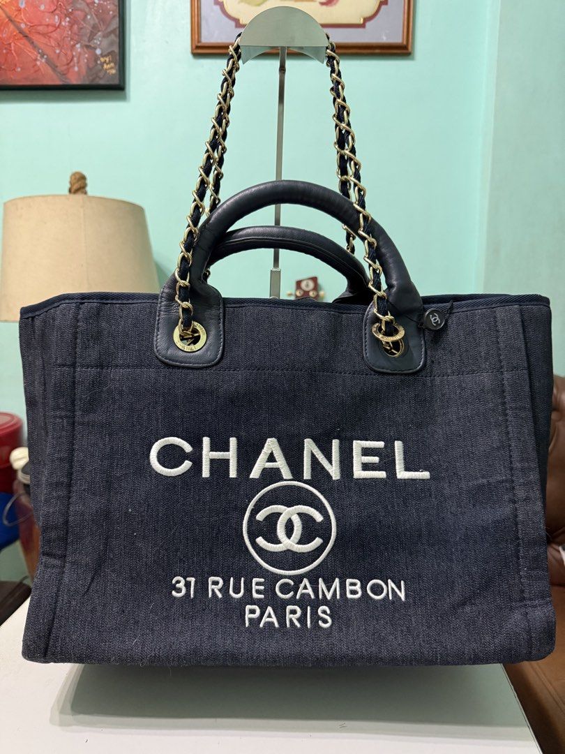 Chanel Deauville Tote Bag (Category: Tote Bags) located in Davao. Submitted by bellbeldz (Listing ID 1466895587, Image 1). Description: -Blue denim canvas with leather trim and dual top handles -in perfect condition -Pretty in actual -With hologram sticker but Auth not guaranteed (in my opinion, it’s orig) -Message me for more pics .