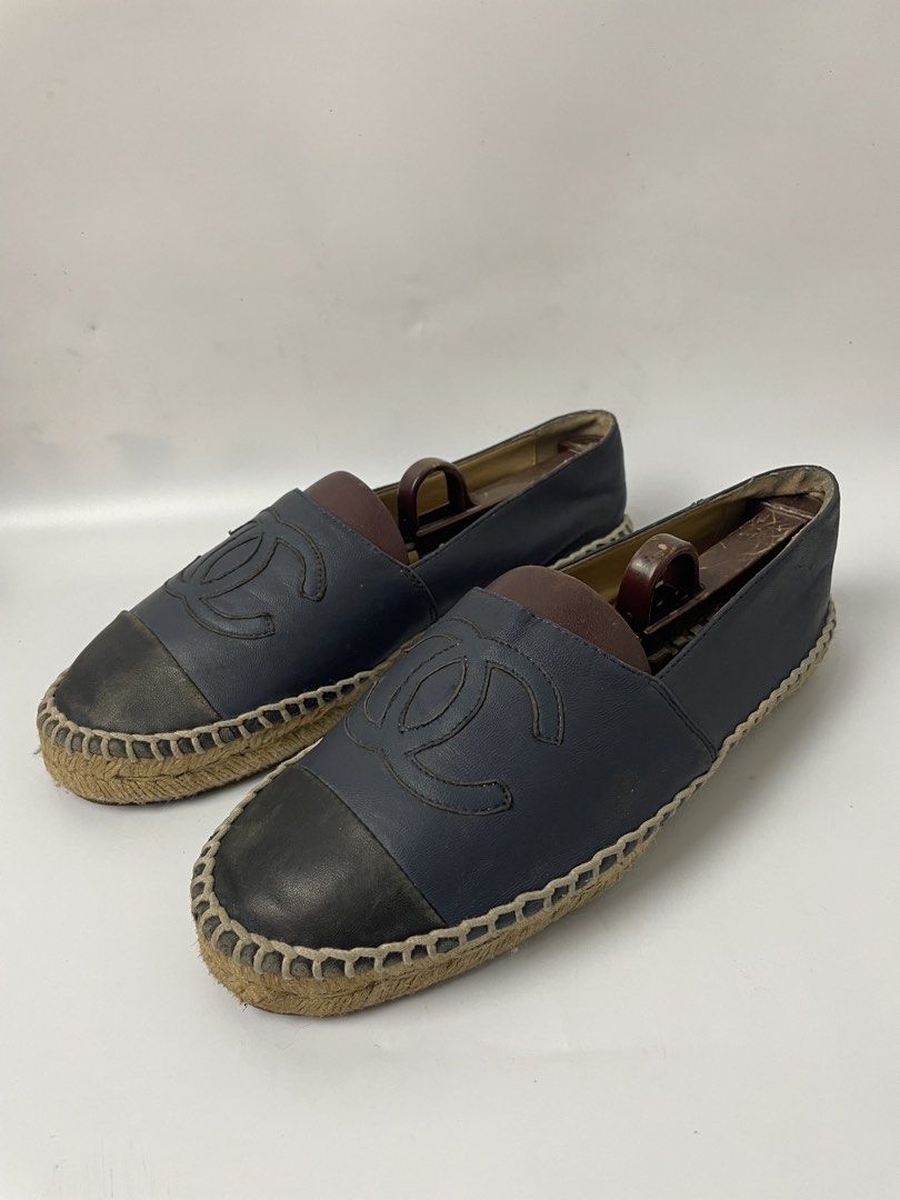 Chanel Leather CC Espadrilles Navy Black Flats (Category: Sneakers & Footwear) located in Manila. Submitted by rdtp2 (Listing ID 1466935205, Image 1). Description: size 38 flaw fade color leather 9/10.