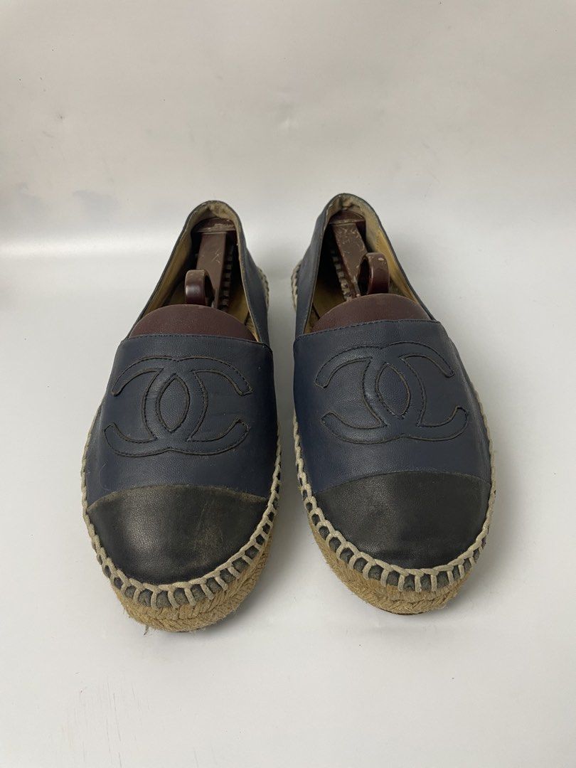 Chanel Leather CC Espadrilles Navy Black Flats (Category: Sneakers & Footwear) located in Manila. Submitted by rdtp2 (Listing ID 1466935205, Image 2). Description: size 38 flaw fade color leather 9/10.