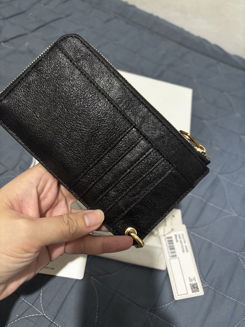 Charles & Keith Lilith (Category: Wallets & Card holders) located in Manila. Submitted by declutter_byjaq (Listing ID 1466928682, Image 3). Description: Charles & Keith Lilith CK6-50770755 Colour: Black In excellent condition Good as New Used twice only Impulsive buy RFS: Needs Cash.