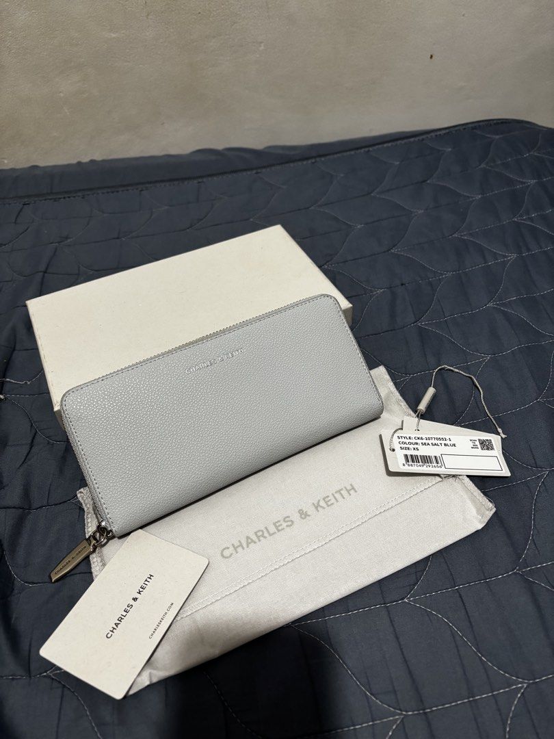 Charles & Keith Long Wallet (Category: Wallets & Card holders) located in Manila. Submitted by declutter_byjaq (Listing ID 1466926930, Image 2). Description: CHARLES & KEITH LONG WALLET Details: Brand: Charles & Keith Style Code: CK6-10770552-1 Colour: Sea Salt Blue Condition: Excellent Condition — good as new! Elegant, classy, and effortlessly chic! The beautiful Sea Salt Blue shade adds a soft, sophisticated touch to your everyday essentials. P