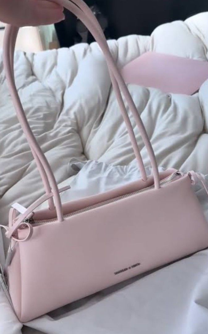 Charles and Keith OG bow bag (Category: Shoulder Bags) located in Manila. Submitted by mariafaye03137 (Listing ID 1466728294, Image 1). Description: Bought this for 4,399. Bnew with ecobag and paper bag. RFS: Need funds..