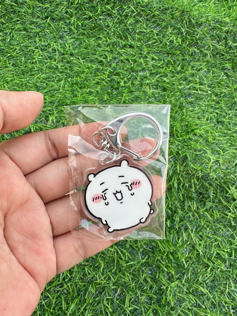 Chiikawa Anime Acrylic Keychains Set (Category: Character Goods) located in Manila. Submitted by ronoarabbit.ph (Listing ID 1466888846, Image 2). Description: ✔️ 2-pc set - Condition: Brand new, sealed in individual plastic packaging - Design: Cute Chiikawa characters and an armored figure with clear double-sided printing - Hardware: Durable silver-tone clasp - Freebie: Includes a small bonus sticker sheet - Perfect for: Bag charms, key rings, or