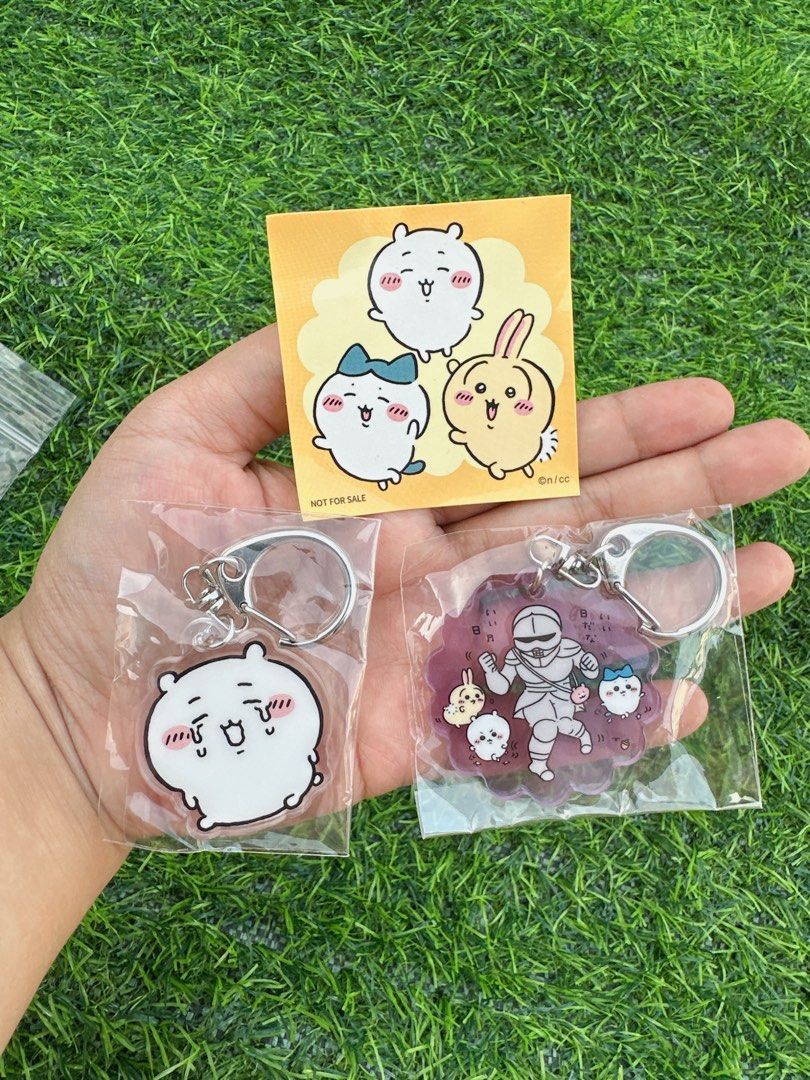 Chiikawa Anime Acrylic Keychains Set (Category: Character Goods) located in Manila. Submitted by ronoarabbit.ph (Listing ID 1466888846, Image 1). Description: ✔️ 2-pc set - Condition: Brand new, sealed in individual plastic packaging - Design: Cute Chiikawa characters and an armored figure with clear double-sided printing - Hardware: Durable silver-tone clasp - Freebie: Includes a small bonus sticker sheet - Perfect for: Bag charms, key rings, or