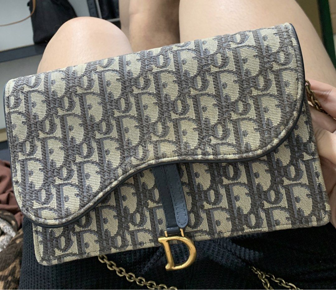 Authentic Christian Dior Oblique Saddle Chain Pouch Bag (Category: Luxury Bags & Wallets) located in San Fernando. Submitted by jrm2911 (Listing ID 1466963128, Image 1). Description: 🛒 NEW TO CAROUSELL? CHECK MY ORANGE SHOP RATINGS: Bago pa lang po ako dito sa Carousell, kaya kung medyo alanganin pa po kayo, pwede niyo pong i-check at i-search ang aking Orange Shop name: “JRM 2911 BIZNIZ” para makita ang ating shop ratings, reviews, at successfu