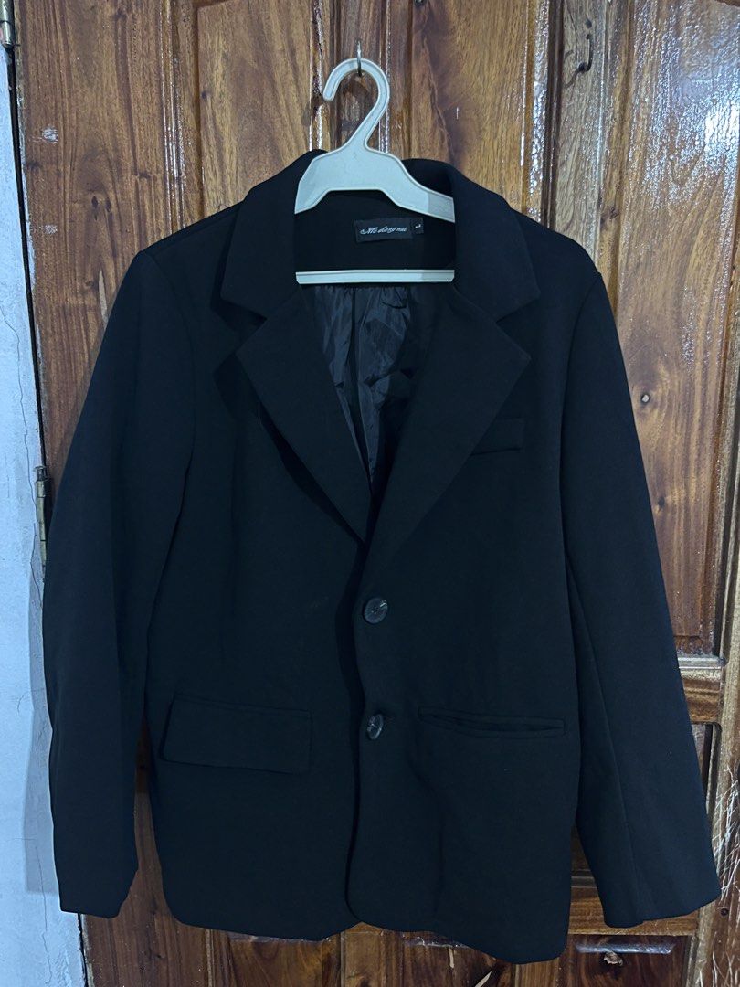 Classic Black Blazer Jacket with Buttons (Category: Coats, Jackets and Outerwear) located in Baguio. Submitted by gbwardrobe (Listing ID 1466935078, Image 1). Description: - Color: Solid black - Size: Large - Closure: Two-button front with matching dark buttons - Interior: Fully lined in matching black fabric - Pockets: Two lower front flap pockets and a chest pocket detail - Style: Structured lapel collar, standard long sleeves, clean minimalist