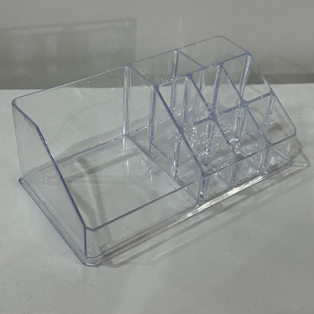 Clear Acrylic Makeup and Cosmetics Storage Organizer Box (Category: Accessory Holder, Box & Organizers) located in Marikina City. Submitted by lovegoeson (Listing ID 1466886664, Image 1). Description: - Clear acrylic desktop organizer for makeup and skincare - Multiple compartments including tall brush slots and lipstick holders - Large open section on the left for big bottles and palettes - Durable, transparent plastic for easy viewing - Keeps v