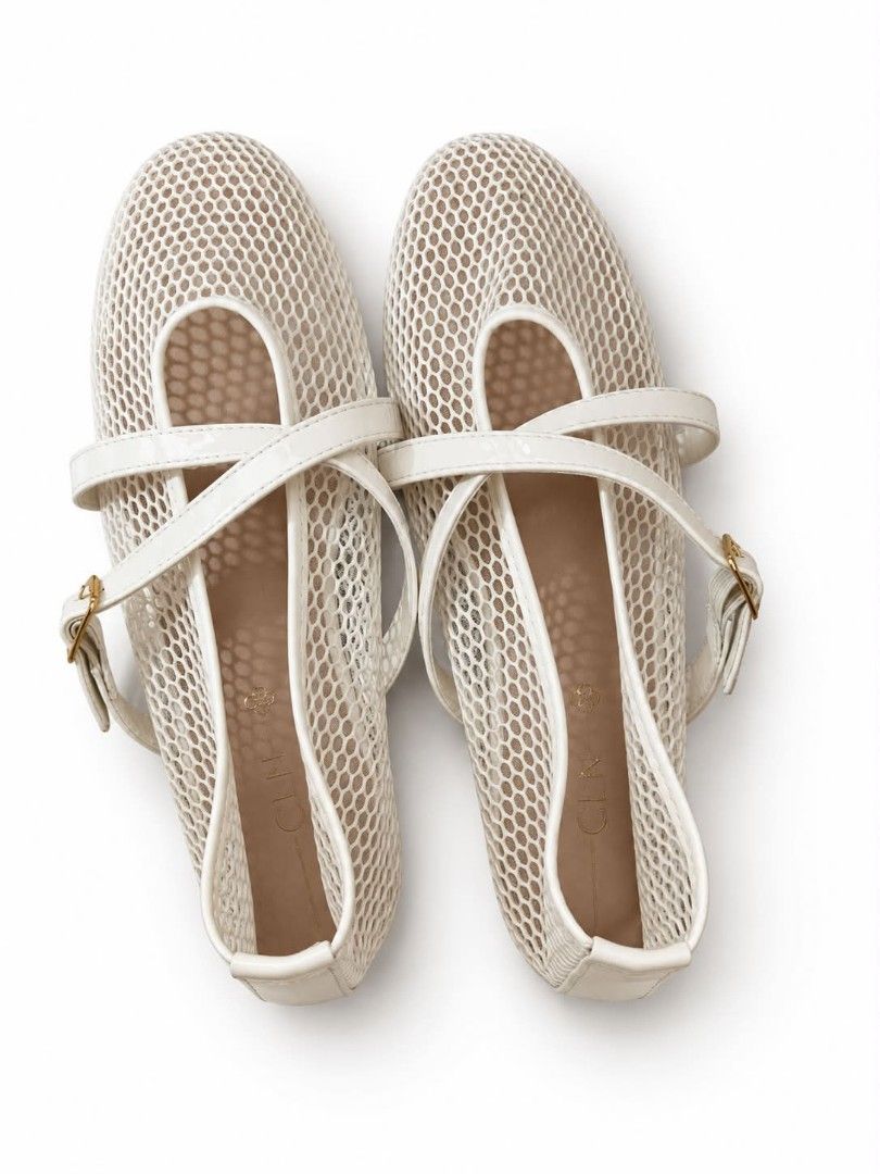CLN Mesh Mary Jane Flats White Size (Category: Flats & Sandals) located in San Jose del Monte. Submitted by Skin_Care2022 (Listing ID 1466800961, Image 1). Description: - Brand: CLN - Style: White mesh Mary Jane flats with trendy patent straps and gold-tone buckle - Comfort: Lightweight design with a neutral tan insole and gold logo stamping - Condition: Clean soles and crisp white material - Perfect for: Everyday casual wear.