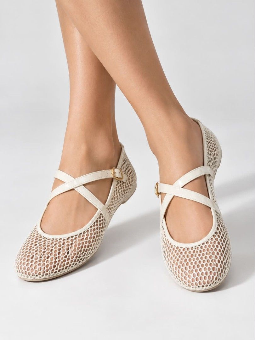 CLN Mesh Mary Jane Flats White Size (Category: Flats & Sandals) located in San Jose del Monte. Submitted by Skin_Care2022 (Listing ID 1466800961, Image 3). Description: - Brand: CLN - Style: White mesh Mary Jane flats with trendy patent straps and gold-tone buckle - Comfort: Lightweight design with a neutral tan insole and gold logo stamping - Condition: Clean soles and crisp white material - Perfect for: Everyday casual wear.