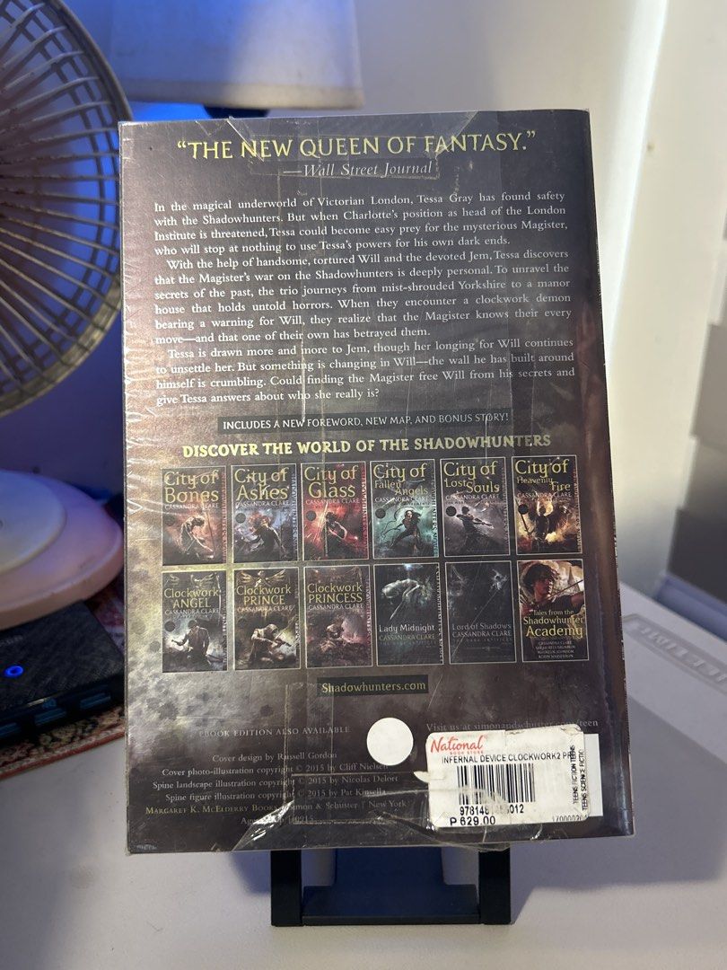 Clockwork Prince by Cassandra Clare The Infernal Devices (Category: Storybooks) located in Santa Rosa. Submitted by sailorplatinum143 (Listing ID 1466781204, Image 2). Description: - Title: Clockwork Prince by Cassandra Clare (The Infernal Devices Series #2) - Format: Paperback with glossy cover and plastic film protection - Condition: Page edges have yellowing and foxing spots, but inside pages are clean - Details: National Book Store price stic