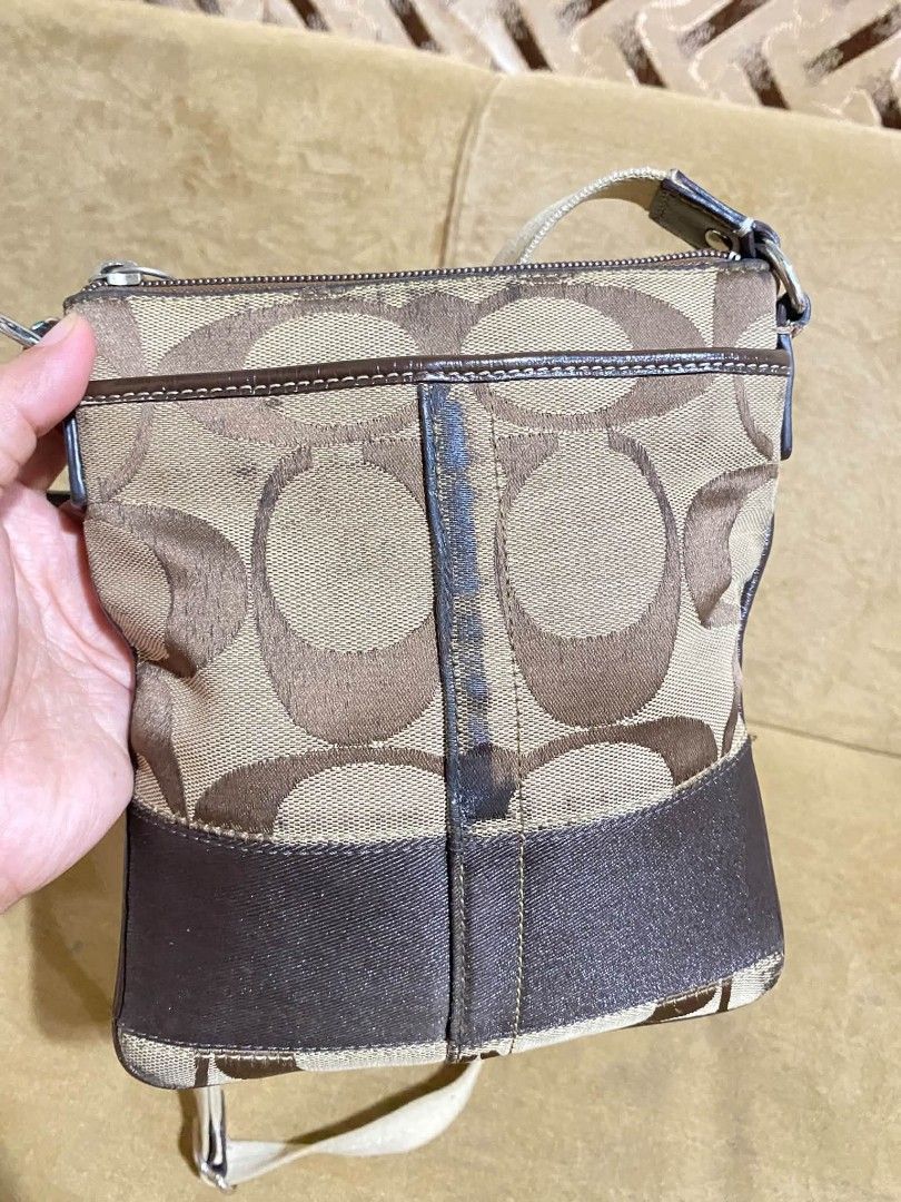 Coach (Category: Cross-body Bags) located in Dumaguete. Submitted by camillaolshoppe2 (Listing ID 1466813187, Image 3). Description: Authentic Signs of usage kayo na magpaganda 650 only.