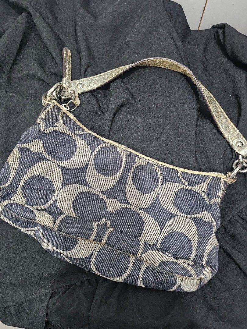 Coach denim stripe demi bag (Category: Shoulder Bags) located in Manila. Submitted by shopaholicmimi (Listing ID 1466949222, Image 2). Description: 📍Vintage Coach Signature Denim Stripe Demi Pouch / Shoulder Bag (F17439) 📍preloved with flaws (please see photos) 📍Condition: Fair / Well-Loved. Denim fabric body is intact and clean. However, please note that the metallic silver leather handle, zipper pull, and top trim are experiencing significan
