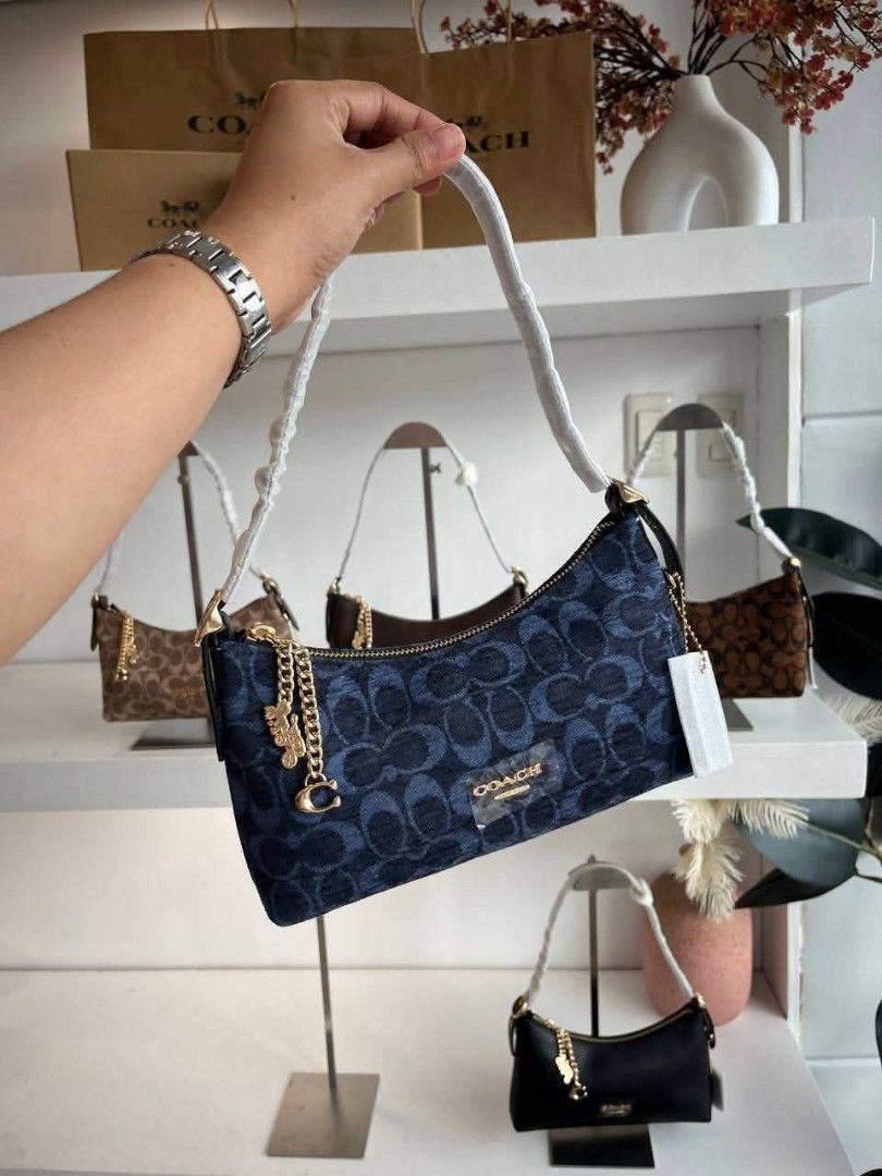 Coach Emeilia Shoulder Bag (Category: Shoulder Bags) located in Quezon City. Submitted by bagsboutiqueph (Listing ID 1466904021, Image 3). Description: LAST PRICE POSTED. LIMITED STOCKS! BRANDNEW WITH INCLUSIONS. COLOR MAY SLIGHTLY VARY IN ACTUAL DUE TO LIGHTING AND CAMERA SETTING. OTHER PHOTOS WILL BE SEND DURING PURCHASE AND FOR SURE BUYERS ONLY. WHEN IN DOUBT, DO NOT ORDER. THANK YOU..
