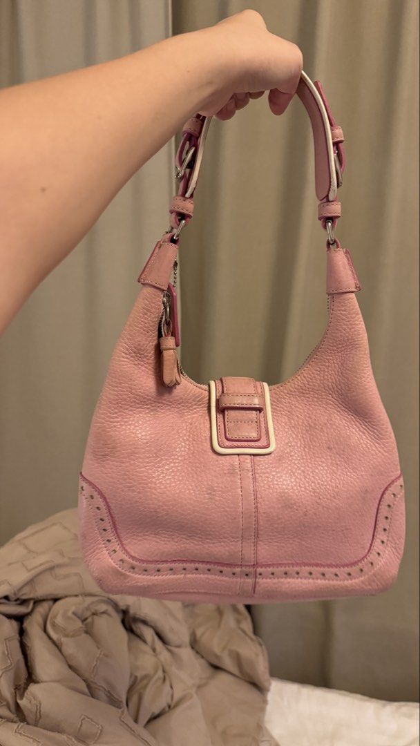 Coach Hampton Hobo Blush Pink Bag soho (Category: Shoulder Bags) located in Muntinlupa City. Submitted by sustelamusa (Listing ID 1466872222, Image 2). Description: Brand: Coach Style: Hampton Hobo Color: Blush Pink with brown fabric lining Hardware: Silver Inclusions: Matching hangtag and tassel charm Interior: 1 zipped pocket and slip compartments Condition: Minor leather discoloration but can be cleaned with a leather cleaner Size: Compact, fi