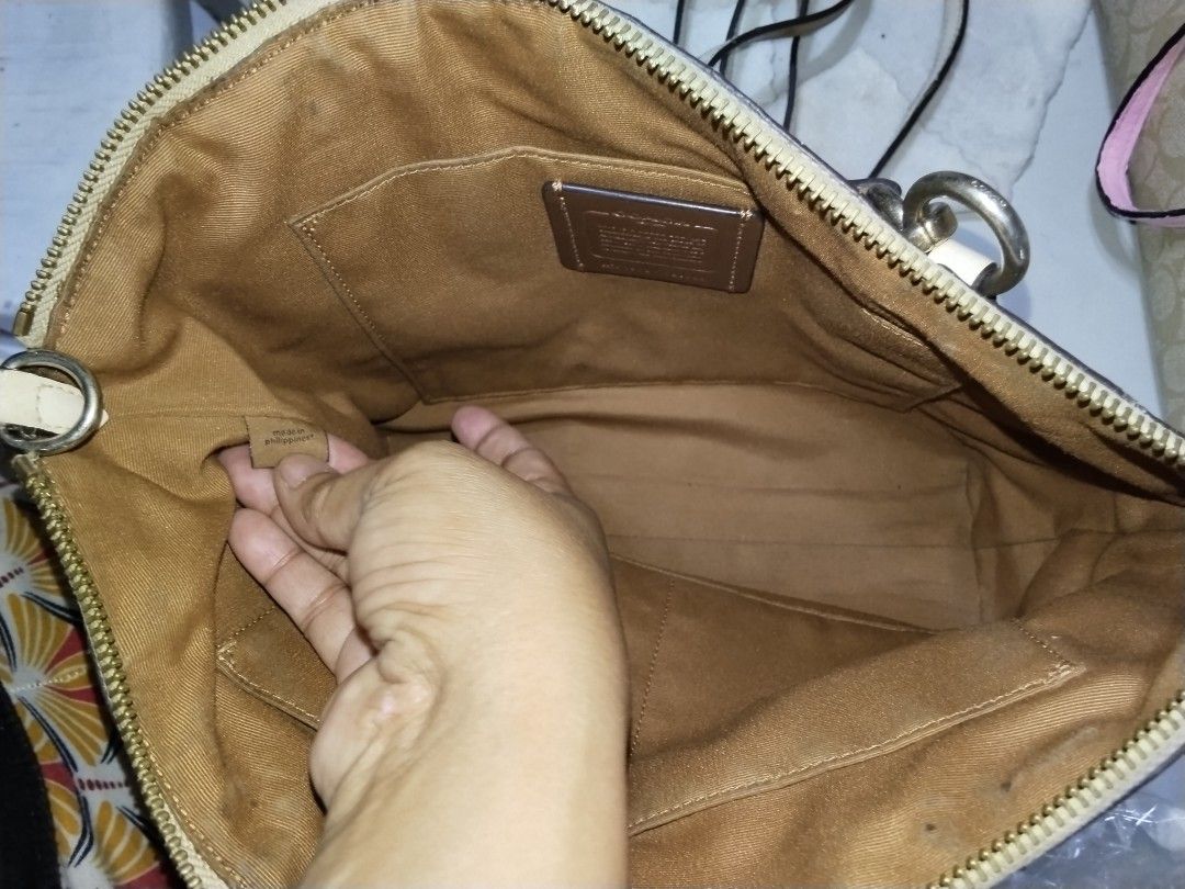 Coach office bag (Category: Cross-body Bags) located in Cavite. Submitted by bagssection04 (Listing ID 1466826417, Image 2). Description: coach medium size 2way with slight issue.