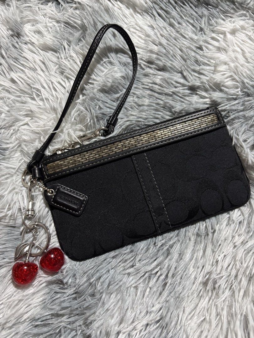 coach wristlet (Category: Purses & Pouches) located in Pasig City. Submitted by bagsby.camillah (Listing ID 1466961591, Image 1). Description: unused condition free cherry charm 🖤.
