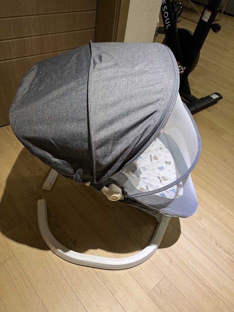 Cocobb Electric Baby Rocker (Category: Cots & Cribs) located in Angeles City. Submitted by myshoppingaccount24 (Listing ID 1466824621, Image 3). Description: - Brand: Cocobb Electric Baby Rocker (Grey) - Comfort & Safety: 3-point safety harness and cozy inner seat pad with a cute teddy bear pattern - Accessories: Includes a protective canopy, mesh mosquito net, and hanging star & moon toys - Design: Stylish white curved base - Power: Includes att