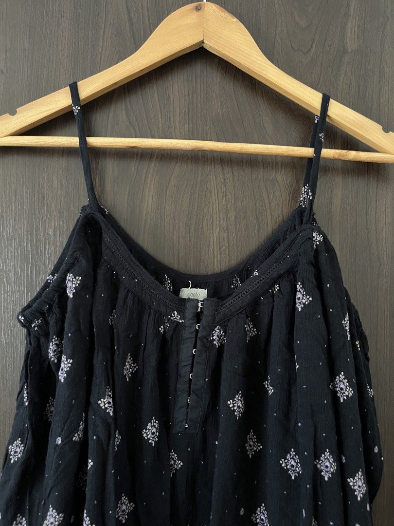 écote black cold shoulder top with floral pattern size m (Category: Blouses) located in Manila. Submitted by mentone (Listing ID 1466839408, Image 2). Description: Black cold shoulder blouse from école. White and lavender diamond and floral pattern printed all over. Delicate spaghetti straps over the shoulders, three-quarter sleeves. Hook and eye placket down the center front. Detailed print border along the hem and sleeve cuffs. Soft, lightweigh