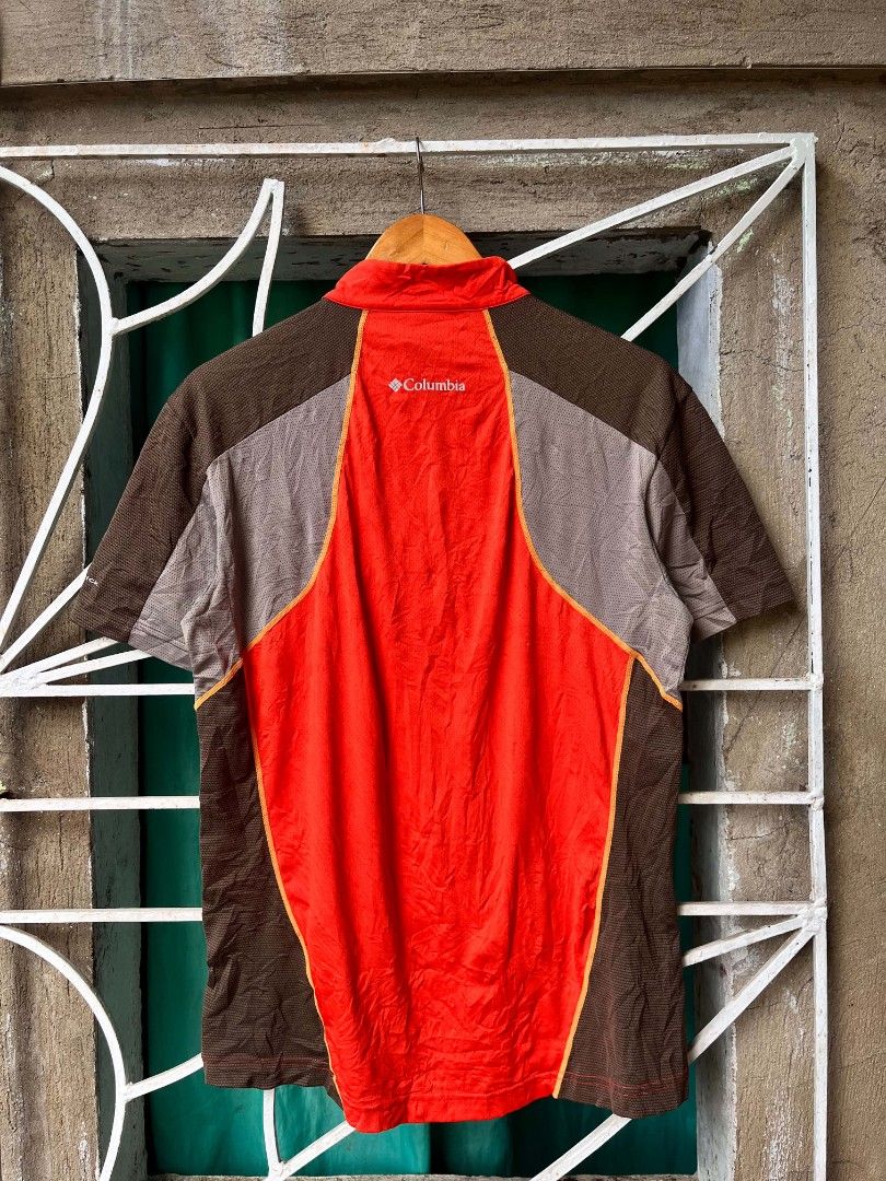 Columbia Qzip Outdoor Tshirt (Category: Tshirts & Polo Shirts ) located in Manila. Submitted by tristan12_13 (Listing ID 1466943911, Image 3). Description: - Size: Large on tag - Dimension: W- 20 L- 27 - Condition: Like new - Flaws: Chest Pocket Puller ( check last pic ) - Color: Orange and brown colorway - Technology: Omni-Wick fabric keeps you dry and comfortable - Ventilation: Mesh panels on sides and sleeves for breathability - Storage: Front