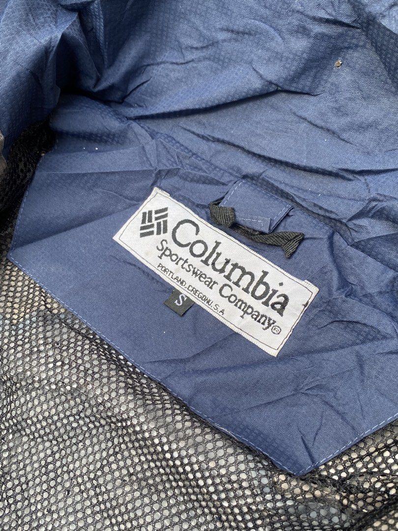 Columbia Titanium Omni-Tech Waterproof Hooded Jacket (Category: Coats, Jackets and Outerwear) located in Abulug. Submitted by axeldot (Listing ID 1466867702, Image 3). Description: - Brand: Columbia Titanium - Color: Blue and Grey - Size: Small - Material/Tech: Omni-Tech breathable ceramic technology with fully seam-sealed construction - Features: Hooded design, zippered chest pockets, hook-and-loop adjustable sleeve cuffs, and comfortable interi