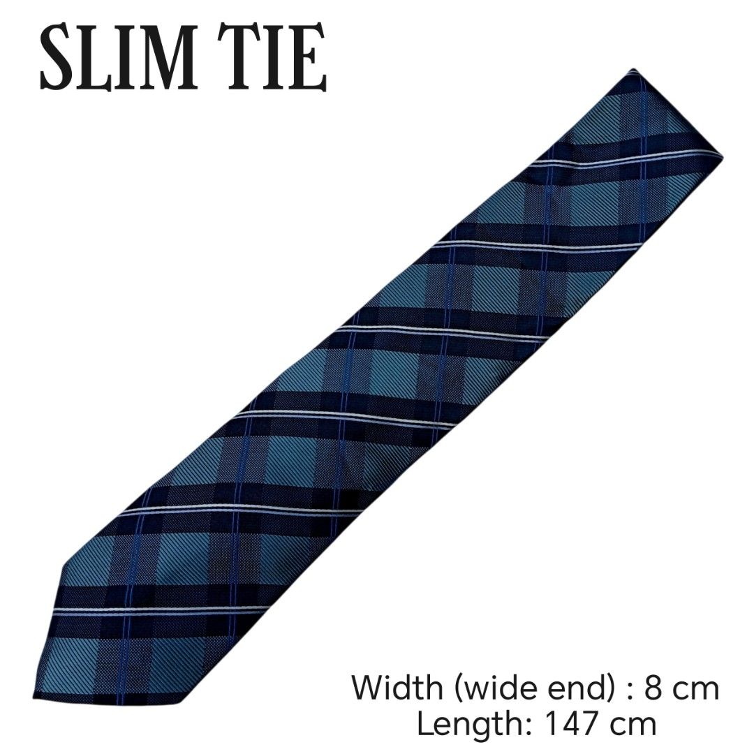 Comme ca men Blue Plaid Checkered Patterned Neck tie (Category: Ties) located in Abucay. Submitted by gibzzz123 (Listing ID 1466816244, Image 2). Description: • All items are ON HAND and ready to be shipped/picked up. • Items are preloved/ukay, so please expect minimal signs of usage unless stated otherwise. • No major issues — good condition unless otherwise indicated in the listing. • Actual color may slightly vary due to lighting and screen se